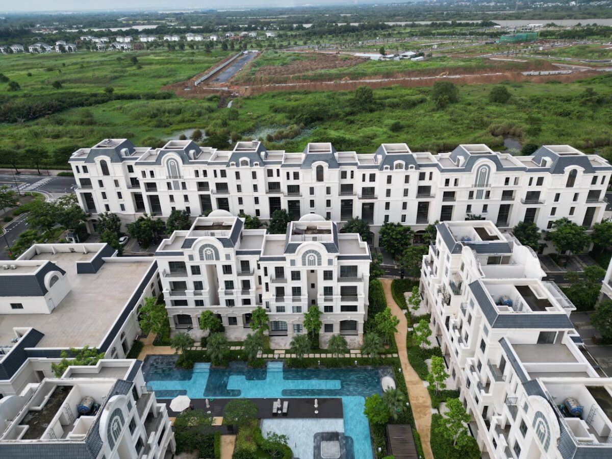 Aerial shot of luxury apartment buildings and a pool in Đồng Nai, Vietnam.